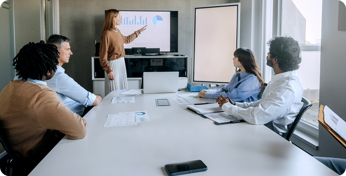 Colleagues in a conference room presentation
